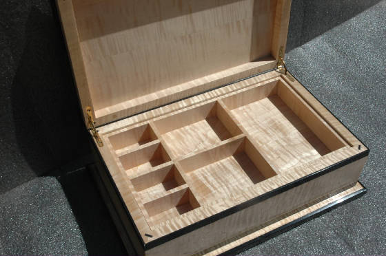 handcrafted jewelry box opened with jewelry tray