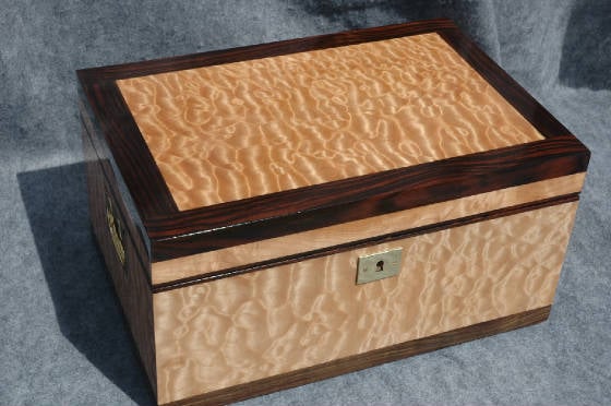 quilted maple instrument quality keepsake box with ebony trim lock top front