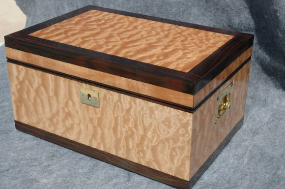 quilted maple instrument quality keepsake box with ebony trim lock top front