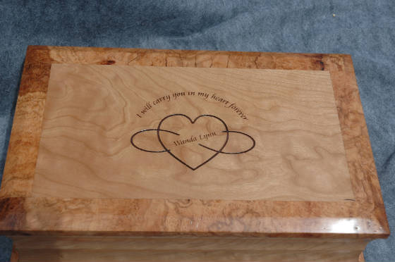 laser engraving of a heart and name